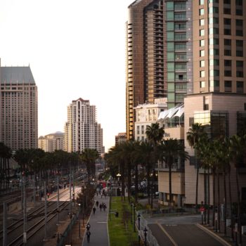 San Diego skyline with walkway and public transit